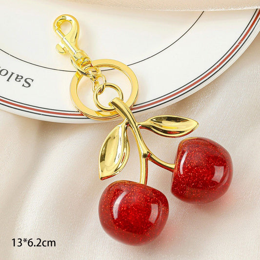 Elegant Red Cherry Bag Charm with double golden leaves, holding lovely little luck to accompany your trips out Kemu |Fashion Home Kitchen Beauty