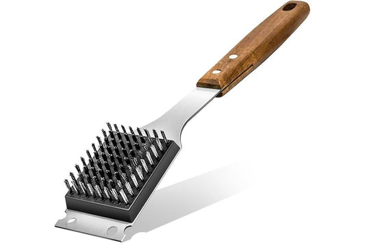 Barbecue brush with wooden handle on a white background
