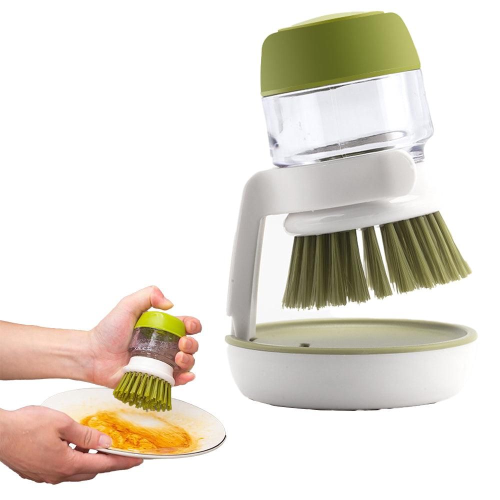 Dish Cleaning brush with a container for soap solution on a white background