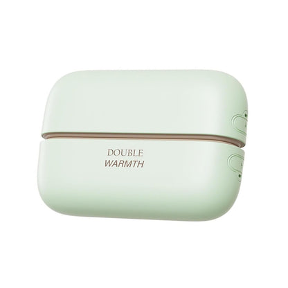 A light mint green portable double-warm heating pad case with 'DOUBLE WARMTH' printed in gold on the front, shown against a plain white background.