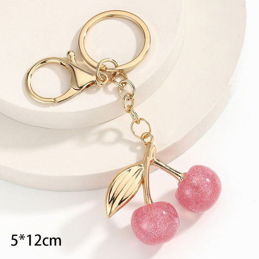 Tiny bubble pink cherry keyring decorated with golden leaves, creating light refreshing cheerful atmosphere all around Kemu |Fashion Home Kitchen Beauty